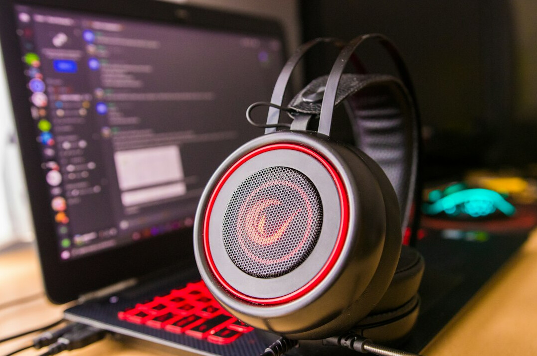 Remote production workstation with laptop and headphones